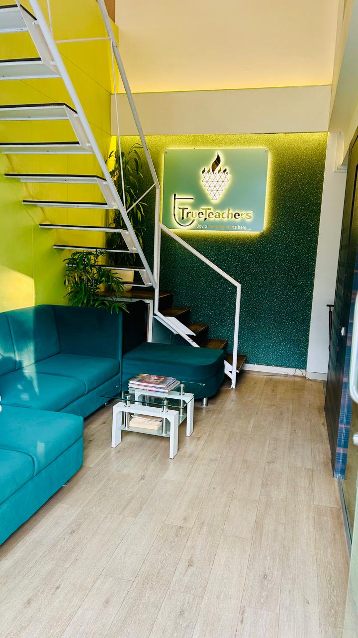 Students actively learning in a classroom at True Teachers Institute