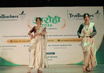 Group photo on stage during the TrueTeachers annual student felicitation event