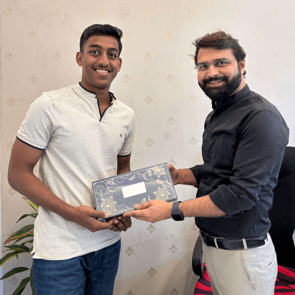 Student achievement ceremony celebrating NEET success at True Teachers